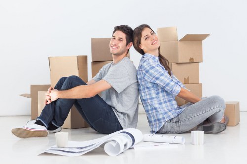 Packed boxes and furniture prepared for a small removals service