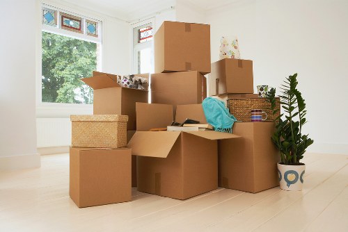 Packed storage boxes and furniture ready for collection