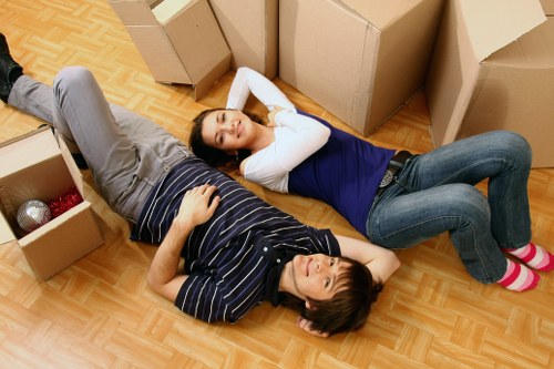 Wrapped sofas and tables prepared for furniture storage