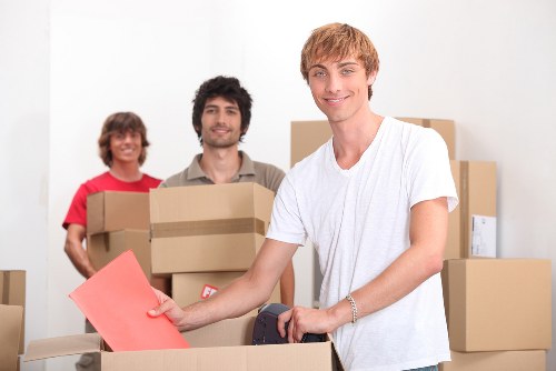 Professional movers loading furniture during East Finchley house removals